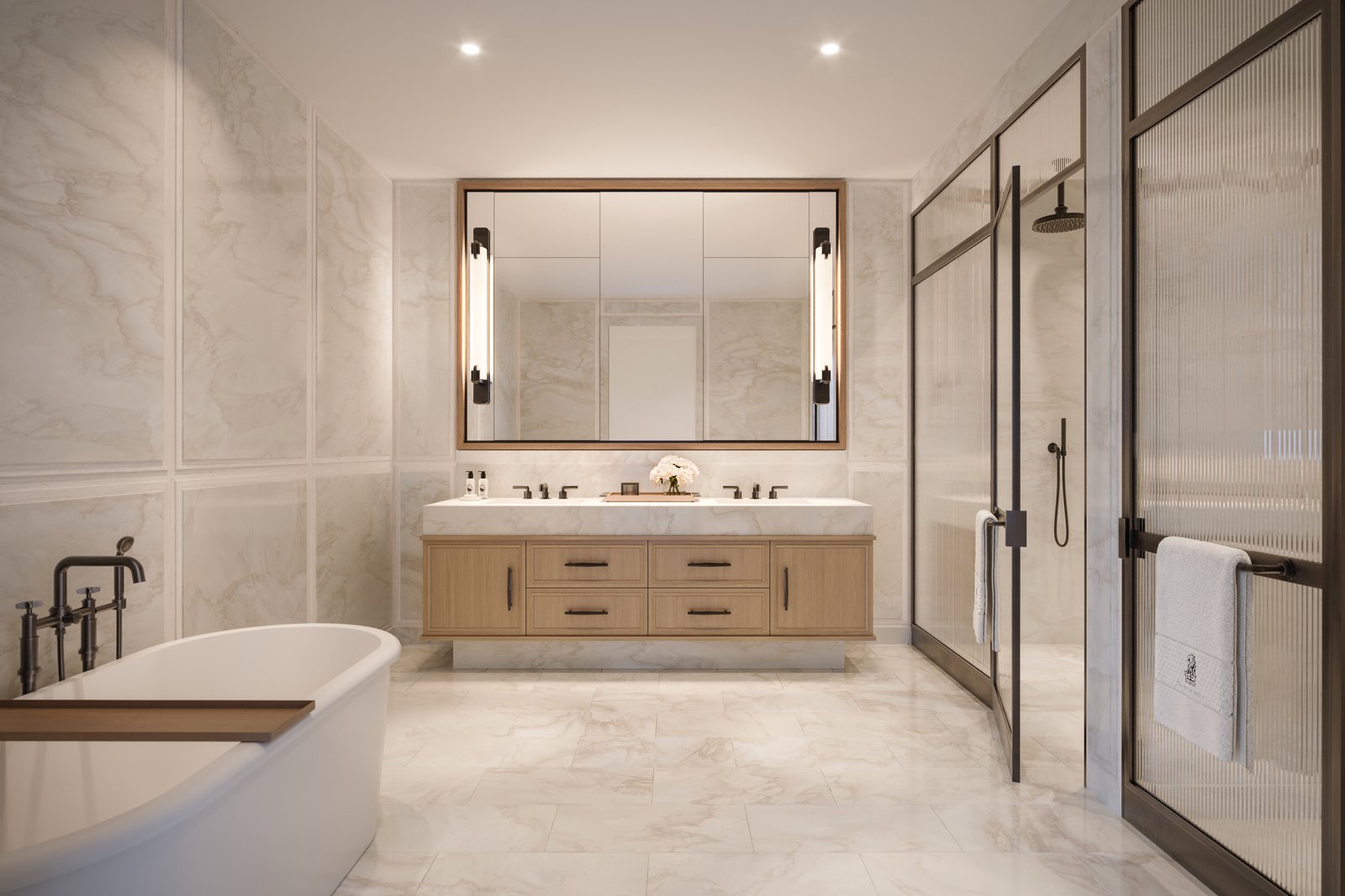 Primary bathroom with freestanding soaking tub and Waterworks fixtures
